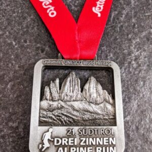customised Sudtirol Drei Zinnen Alpine Run 3D perforated metal medal with antique silver finish and personalised sublimation ribbon