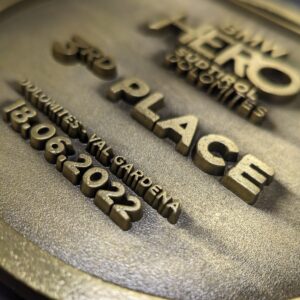 custom hero medal in 2D metal embossed without enamel antique bronze finish and personalized sublimation ribbon detail view