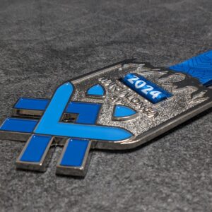 custom marcialonga medal in 2D embossed metal with polished and satin silver finish enamels with personalized sublimation ribbon side view